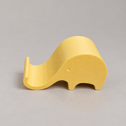 elephant-side: original phone stand photograph, matte PLA surface and 3D printed layer details