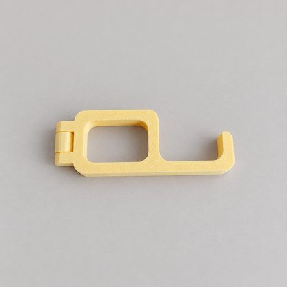 fold-closed: original phone stand photograph, matte PLA surface and 3D printed layer details