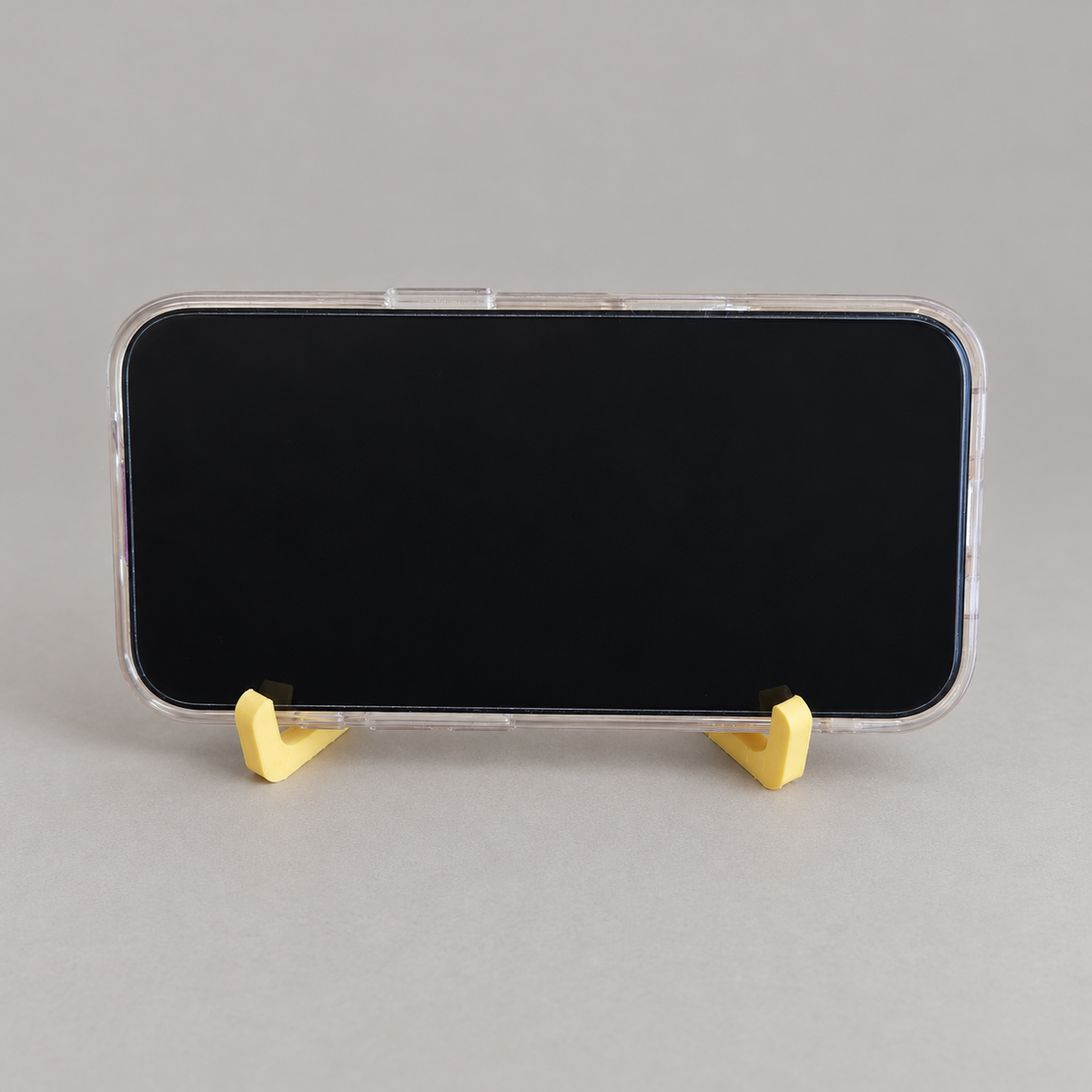 fold-landscape: original phone stand photograph, matte PLA surface and 3D printed layer details